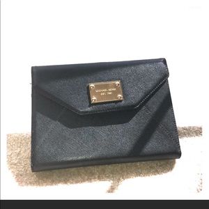 MK black IPad mini case.